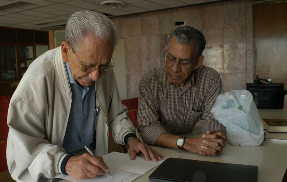 Junto a Delfín Xiques documentalista del periódico Granma